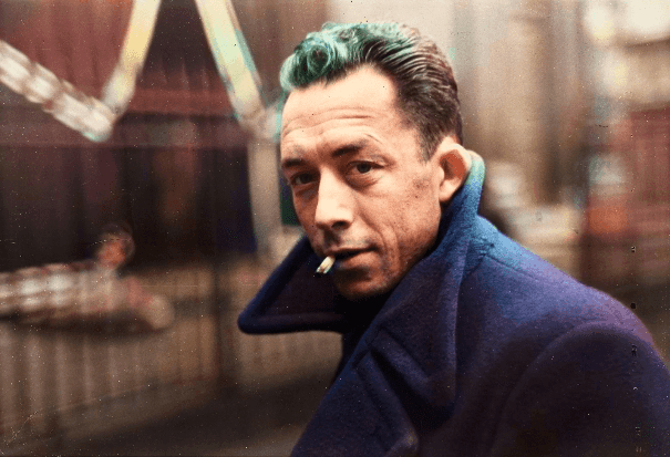 Black and white photo of Albert Camus in Henri Cartier-Bresson’s lens colored using palette.fm